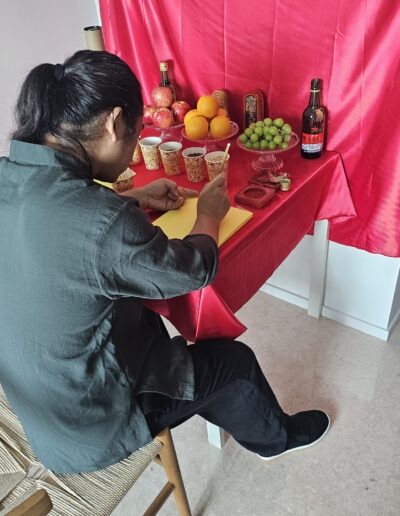 Feng shui consultant conducting a traditional Feng Shui ceremony