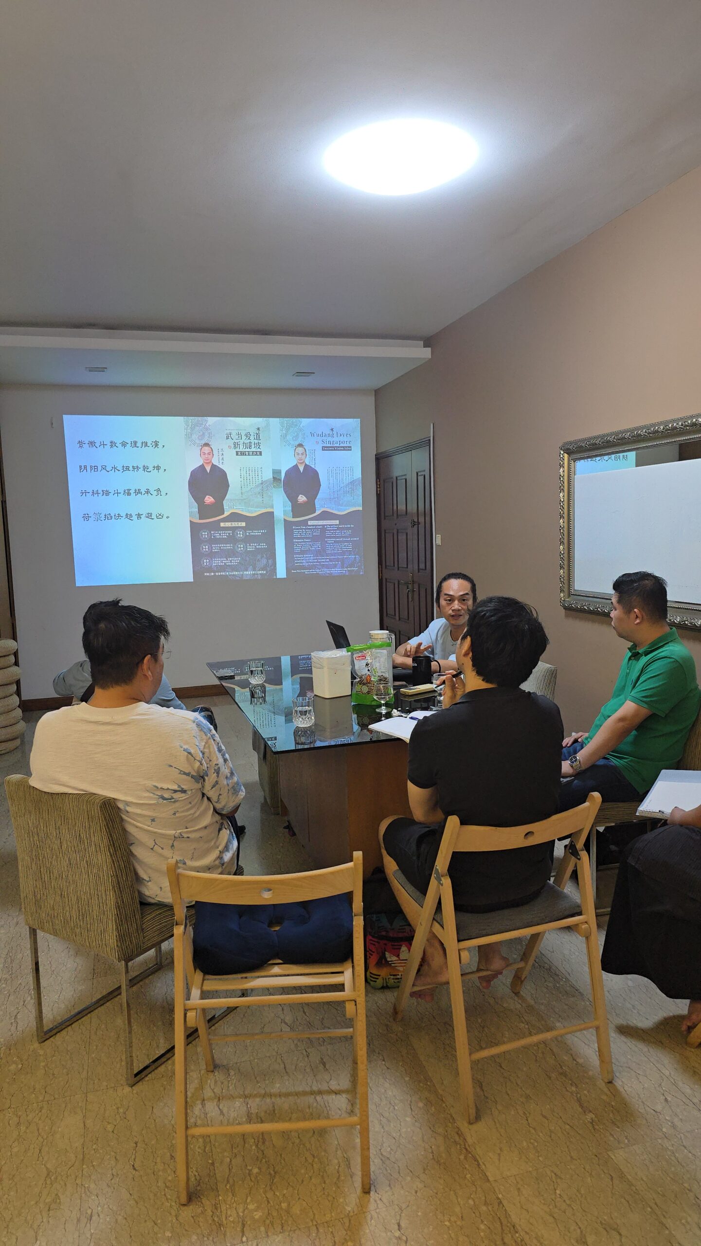 Instructor teaching a Feng Shui class in Singapore